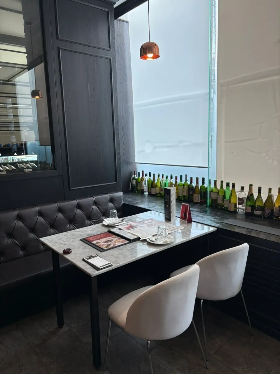 Room interior with displayed liquor bottles