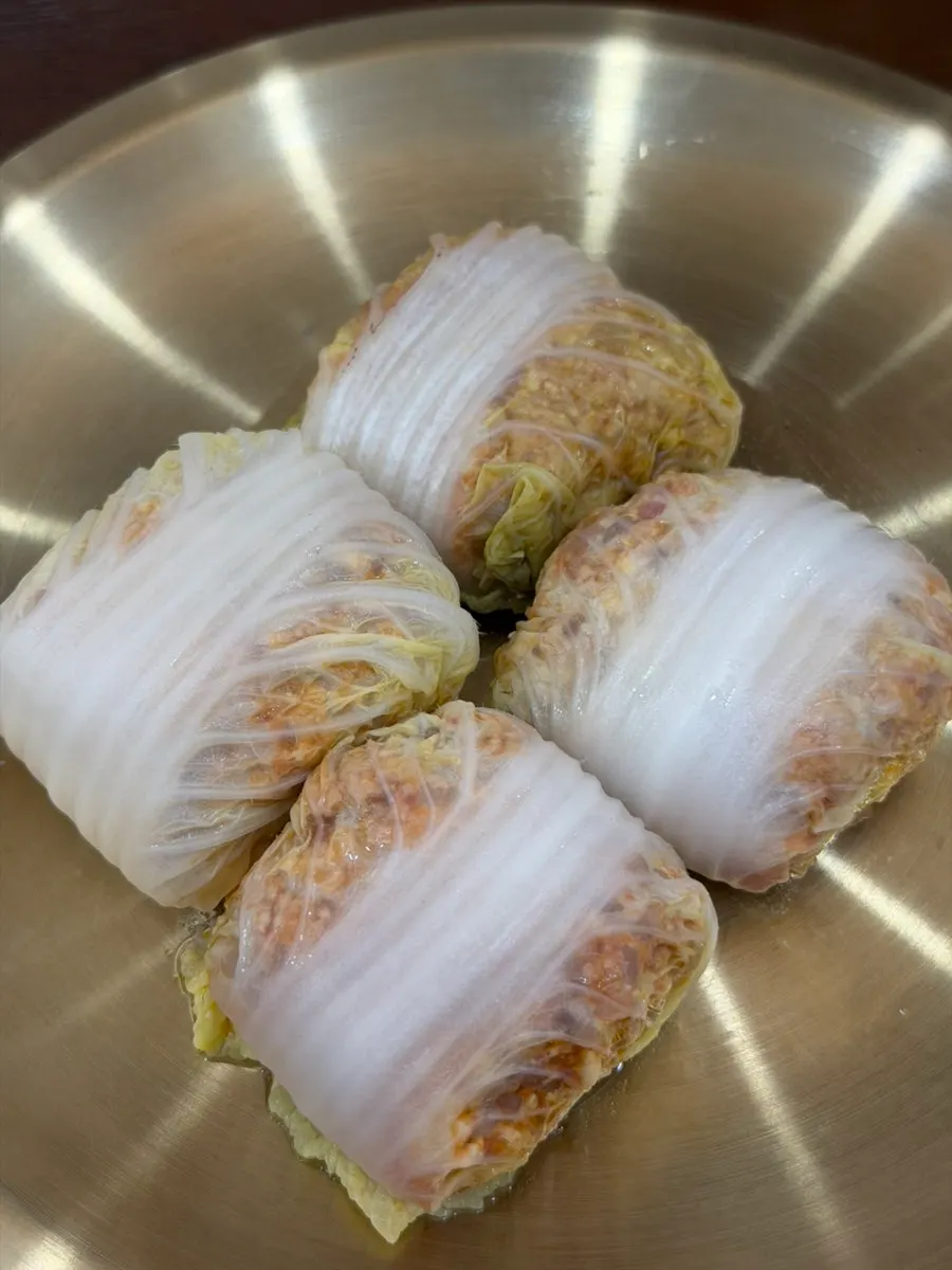 Cabbage dumplings served alongside gomtang