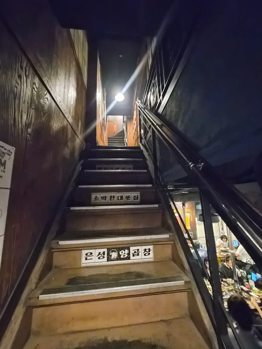 Interior seating at the standalone three-story Yuktongnyeong Myeongdong Main Branch