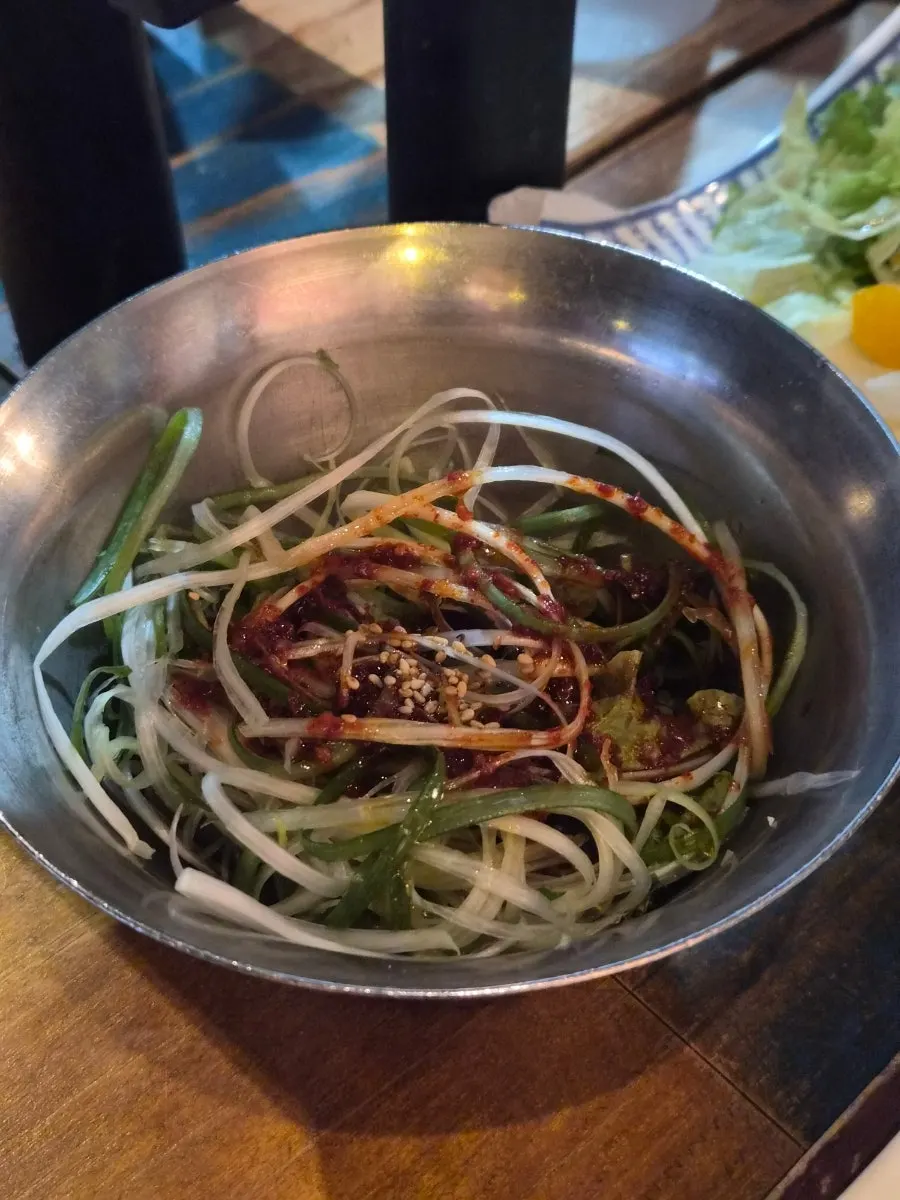 A plate of shredded scallions