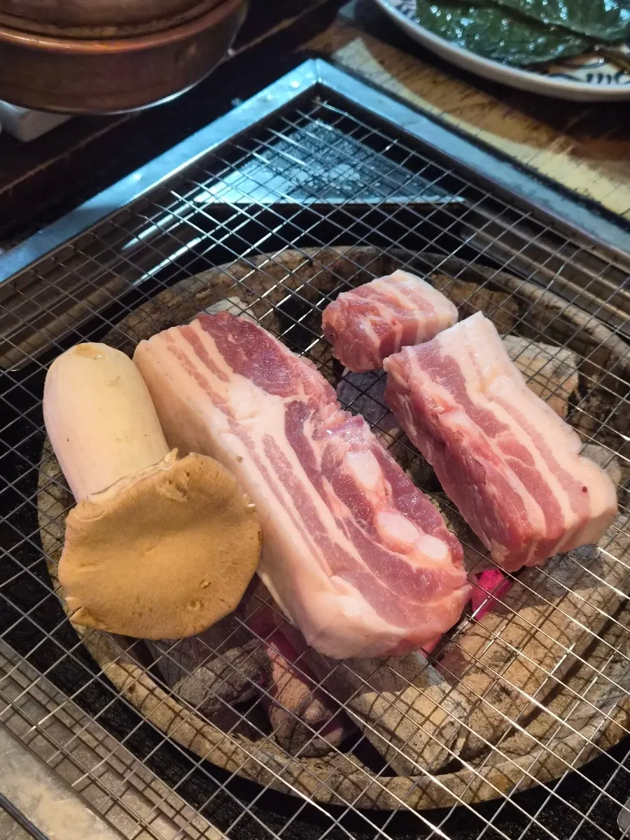 Raw omija-aged black pork premium yukgyeopsal, two servings