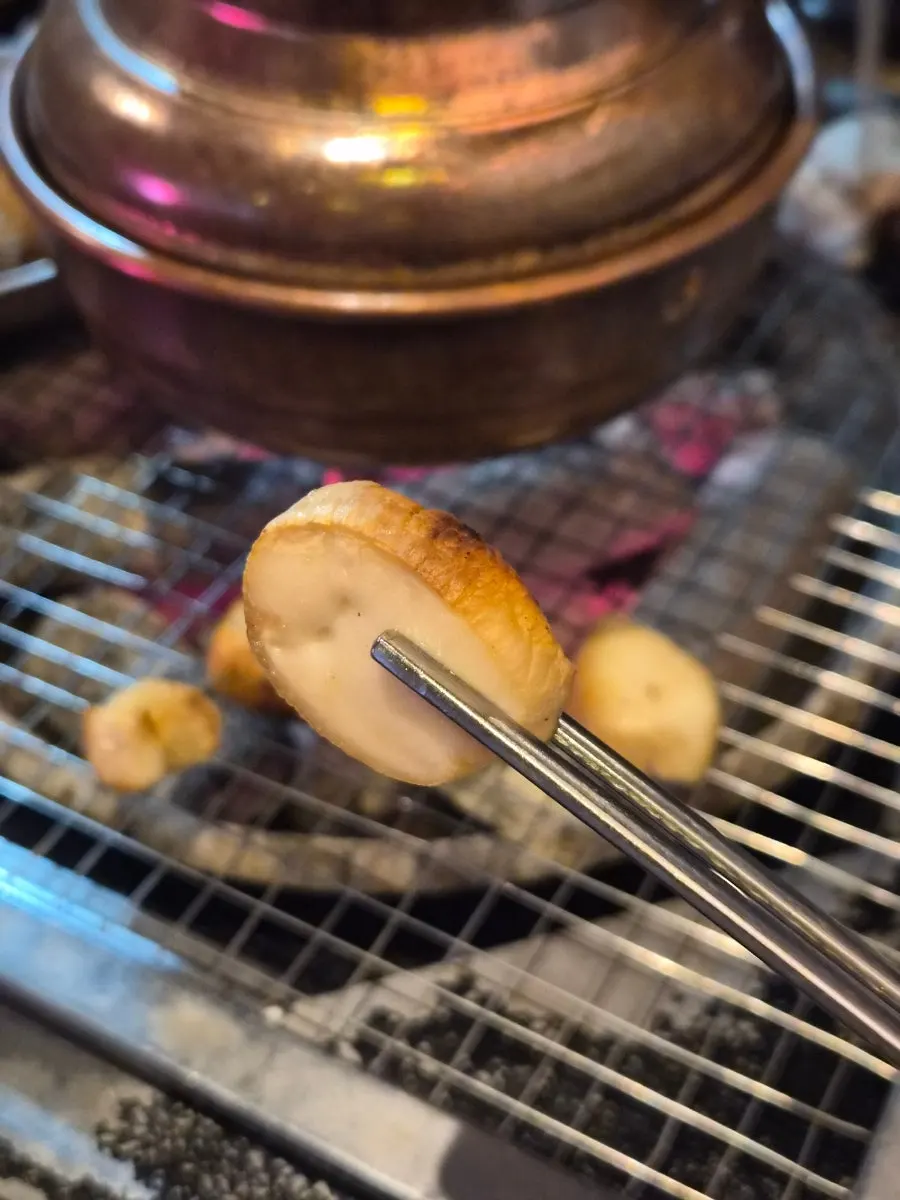 Grilled mushrooms cut into bite-sized pieces