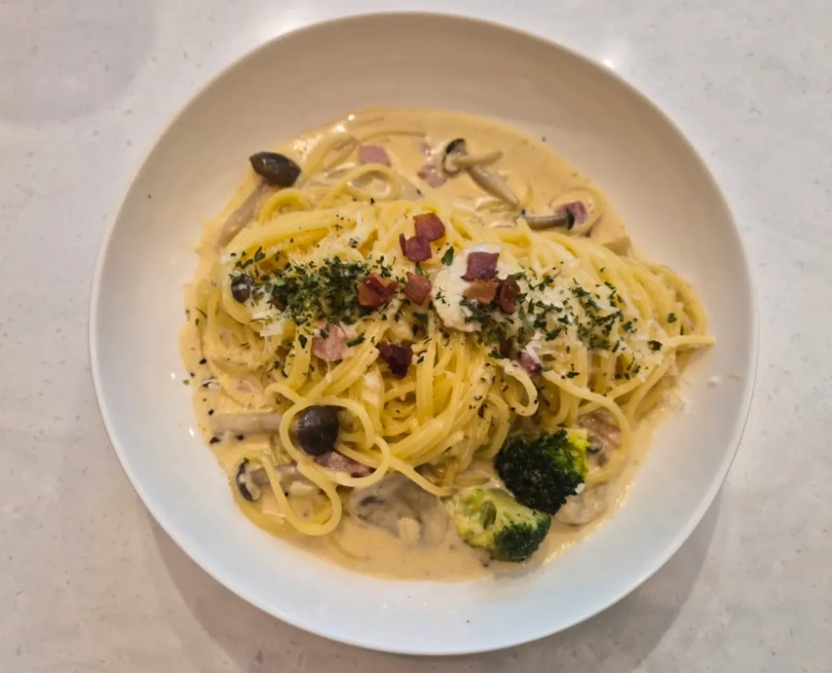 Plate of bacon mushroom pasta at Seventy Four