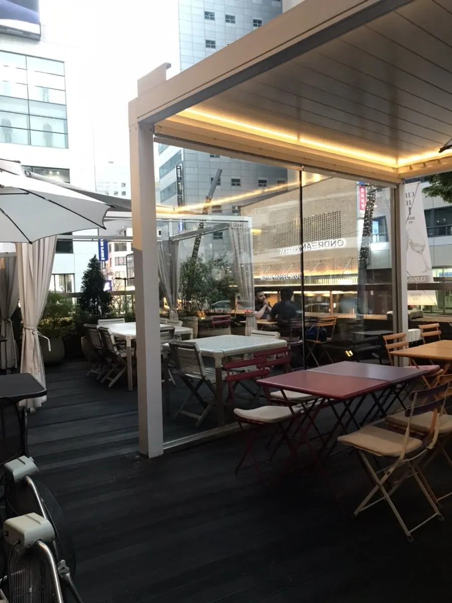 Terrace seating set up beneath Myeongdong Cathedral