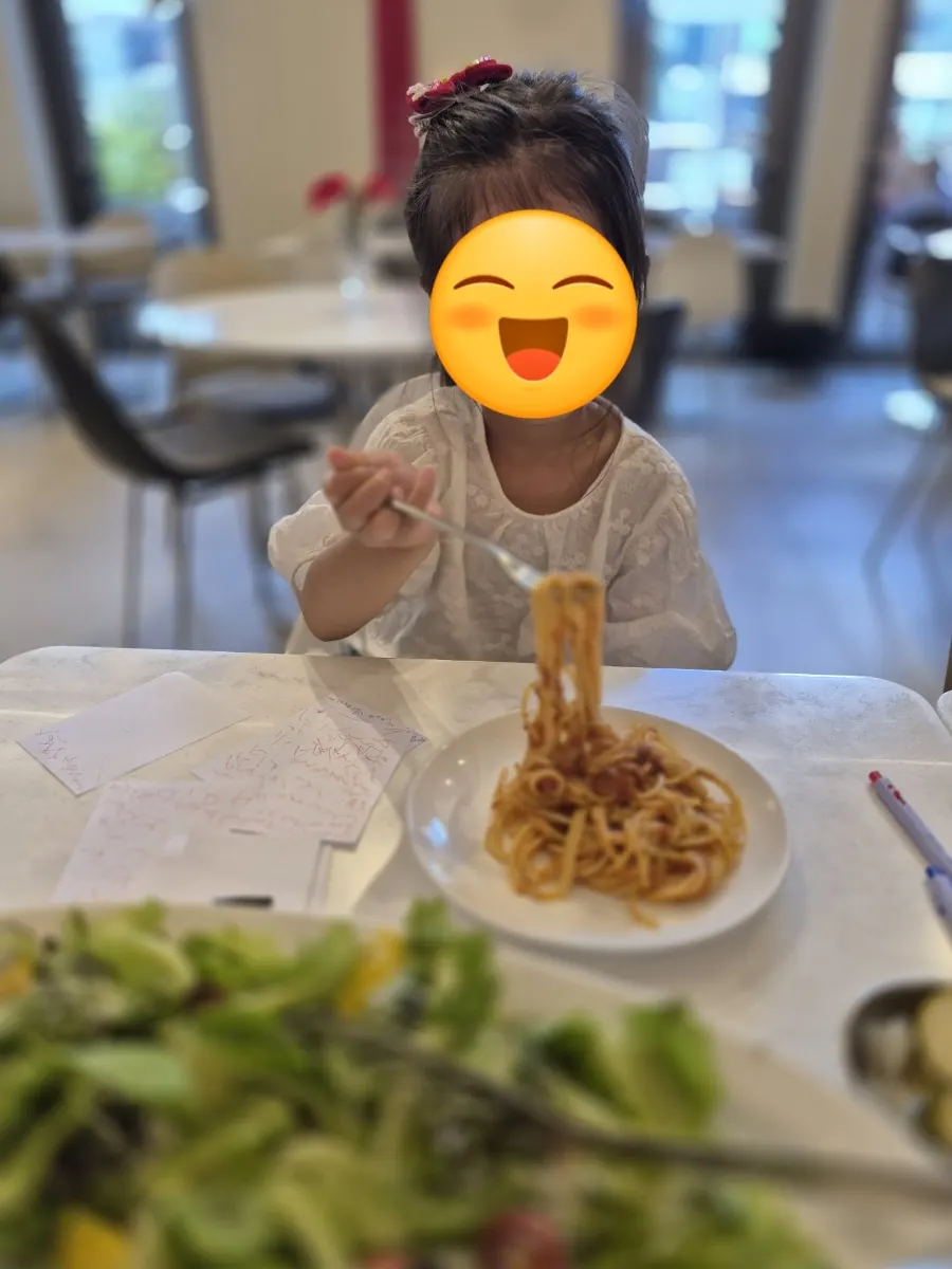 Scooping up pasta with a fork