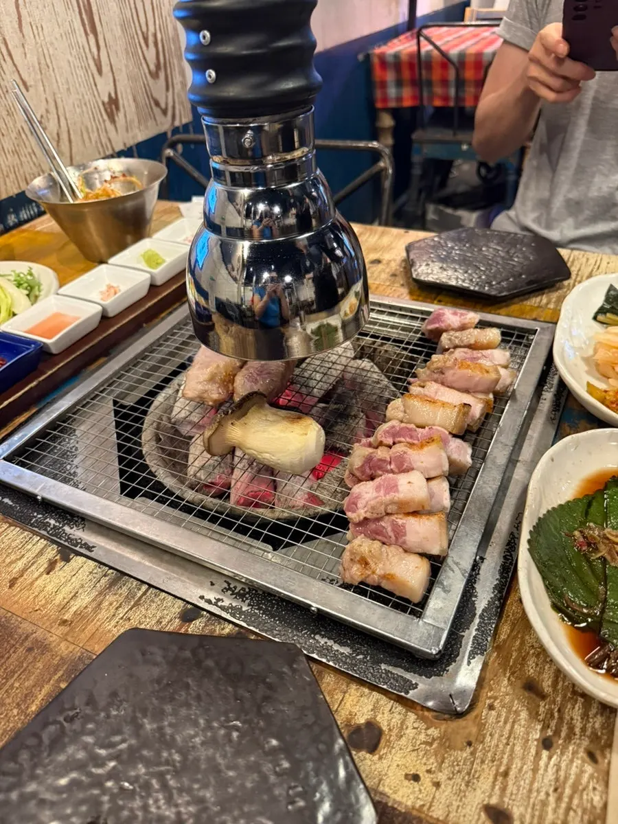 Meat getting a final grill on the pan
