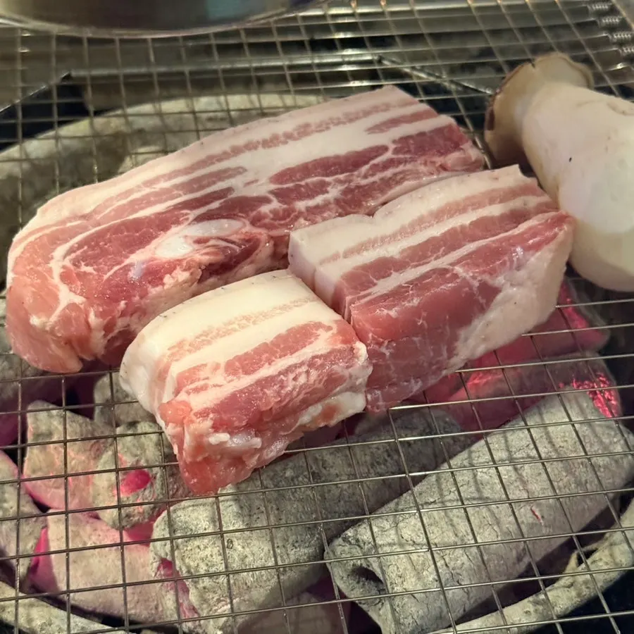 Plate of yukgyeopsal showing lean meat and fat layers