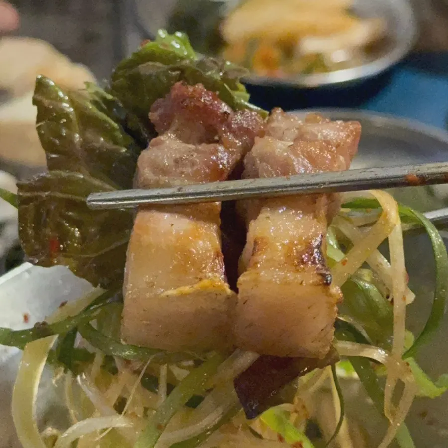 Side dish plates served alongside the meat