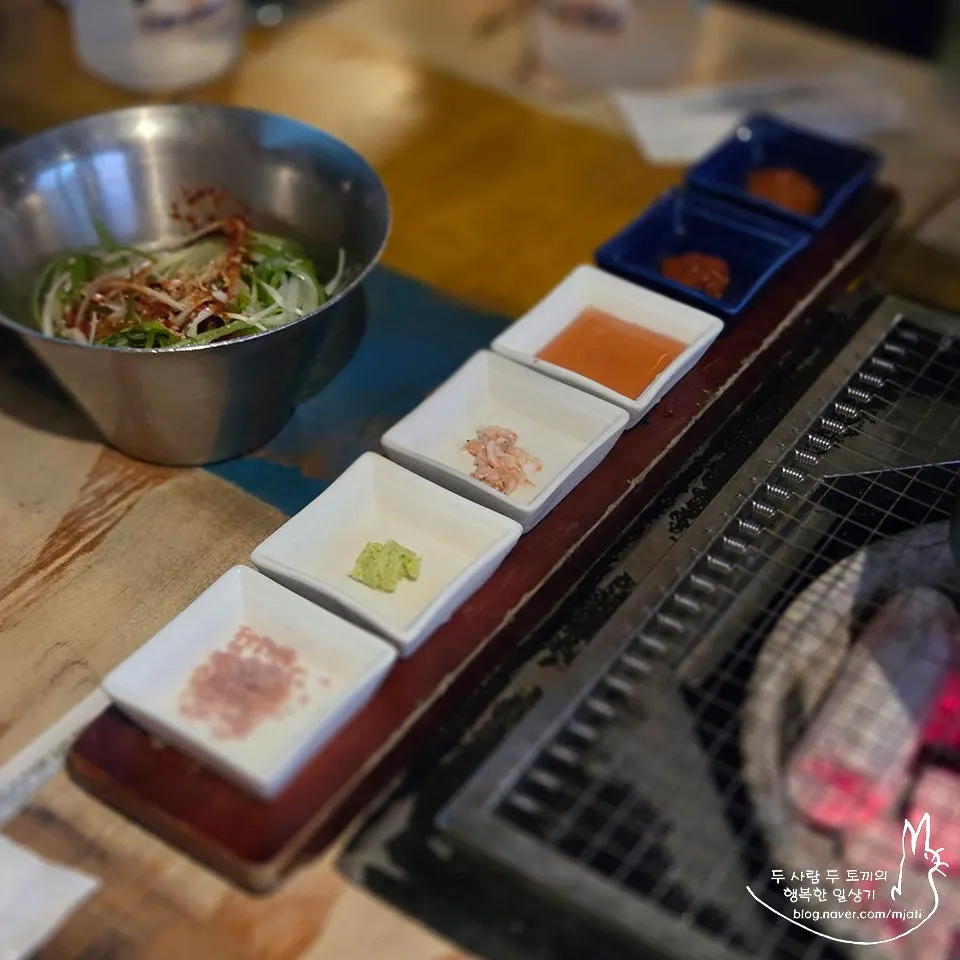 Meat and basic side dishes laid out on the table
