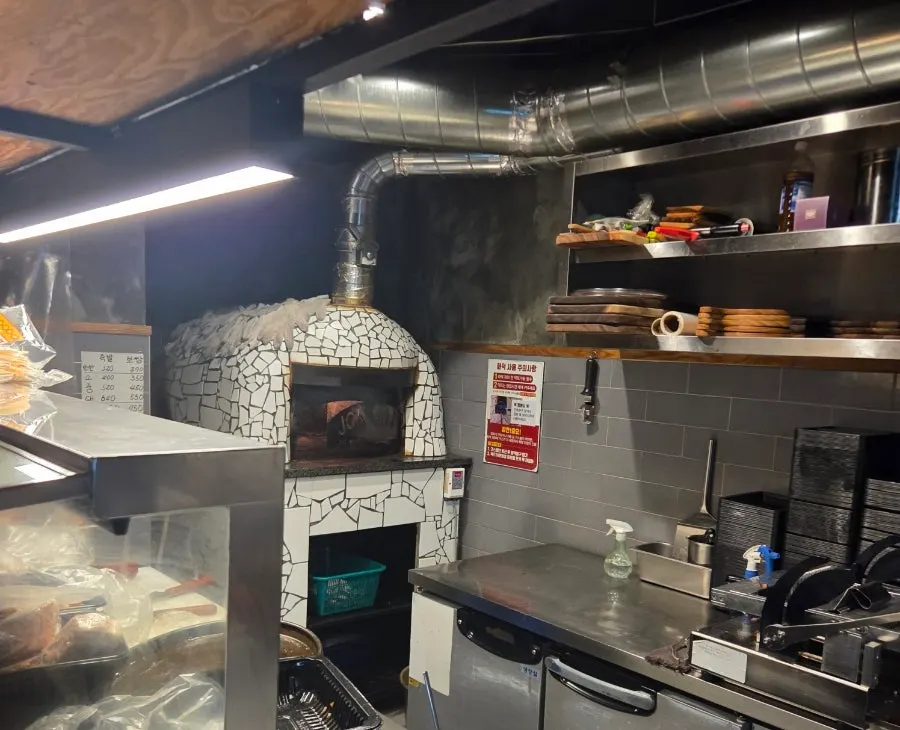 Inside the restaurant's wood-fired oven