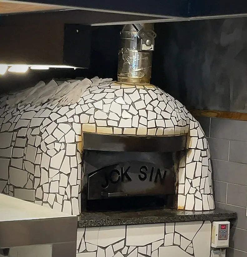 The wood-fired oven space inside the restaurant