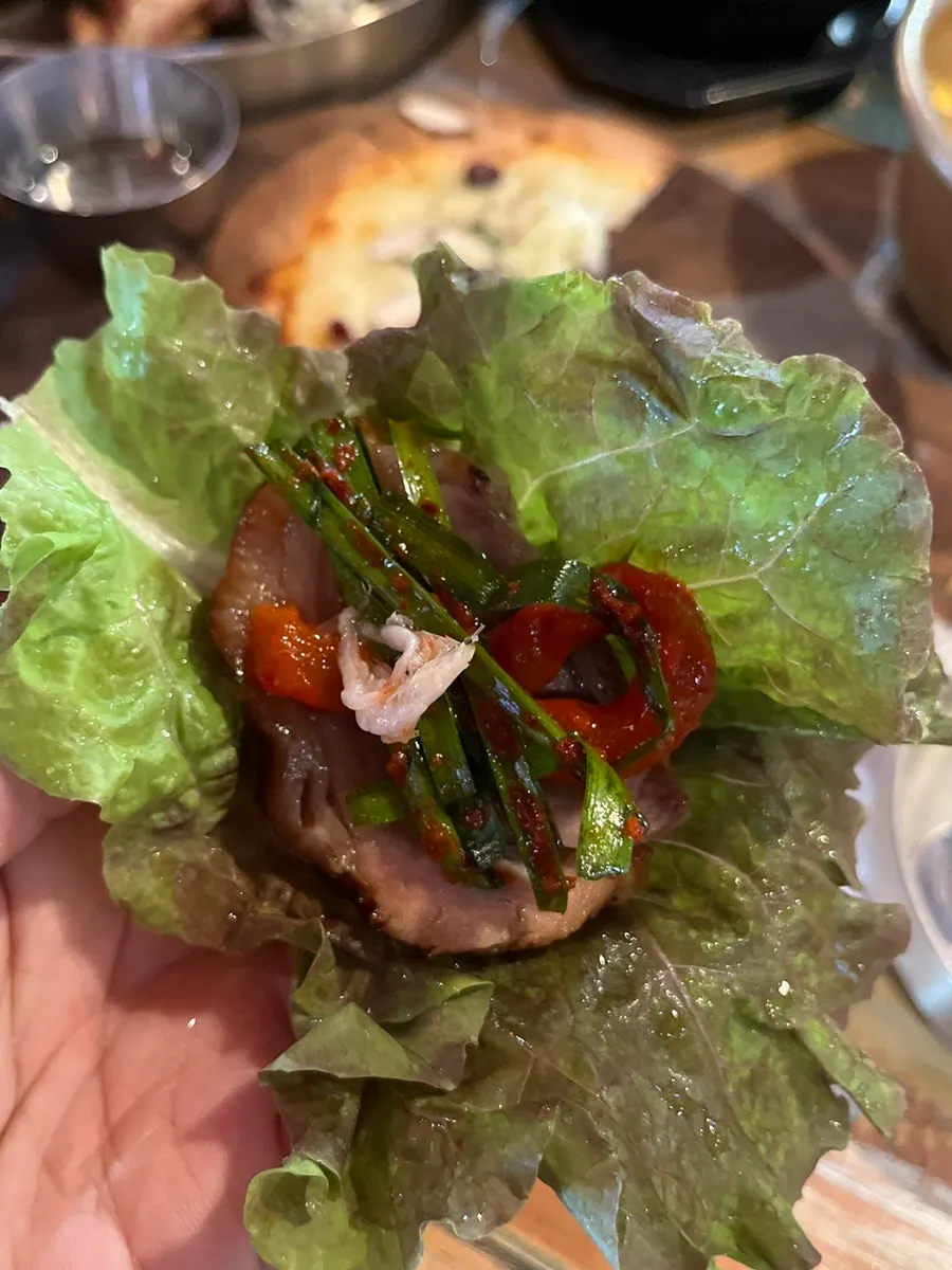 Wood-fired jokbal wrapped with garlic