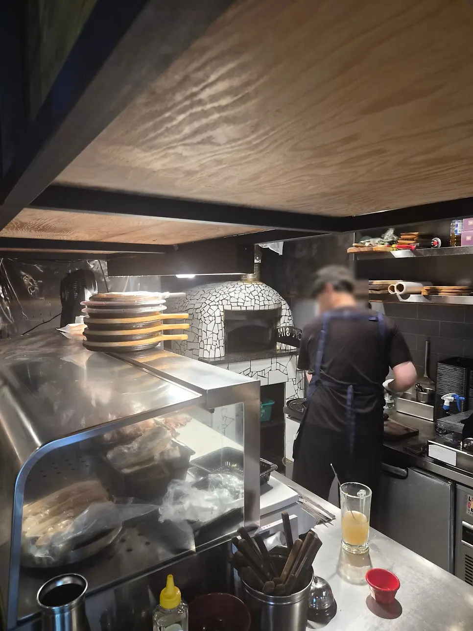 Jokbal and pizza cooking in the wood-fired oven