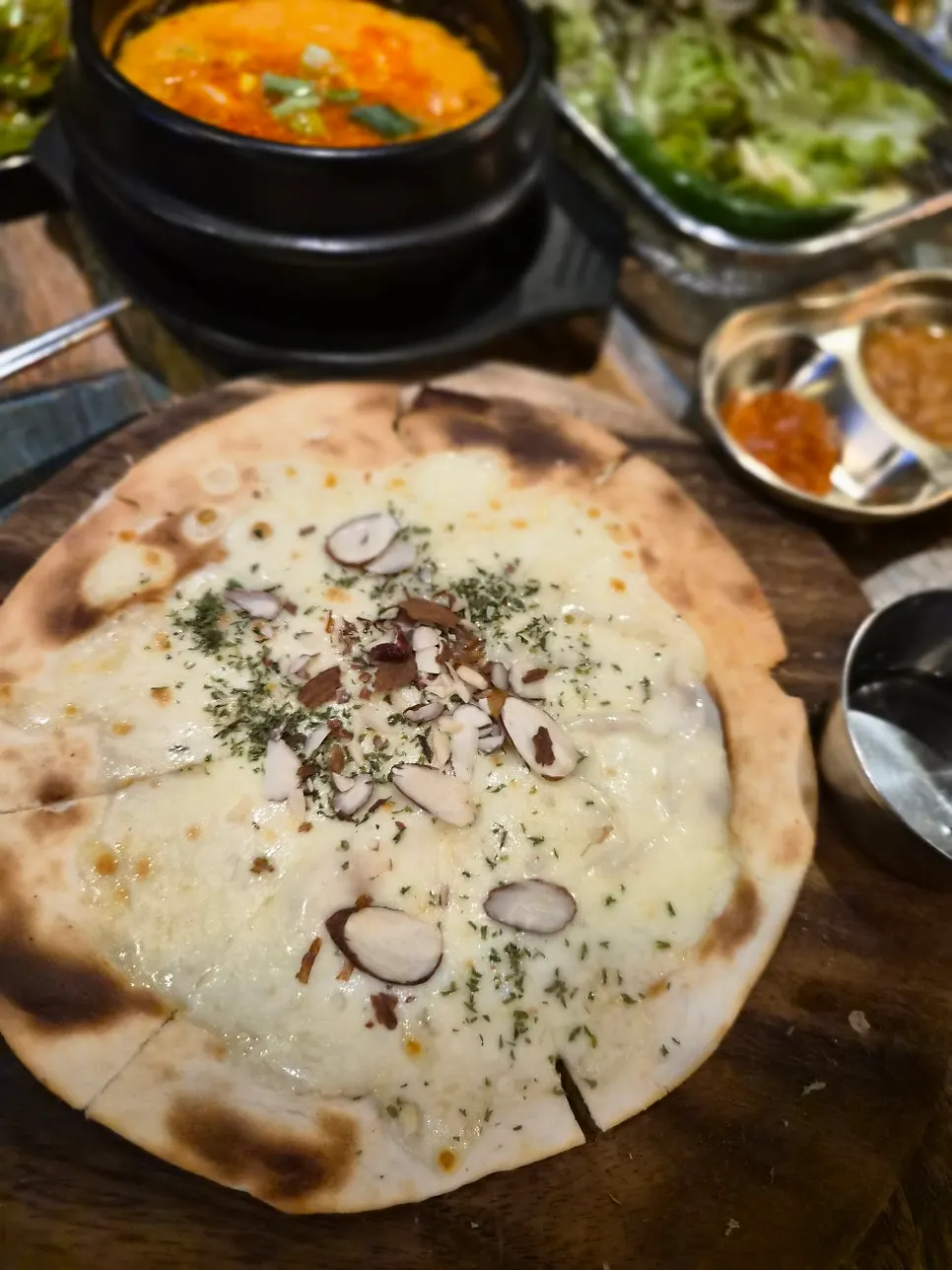 Slice of wood-fired pizza with honey