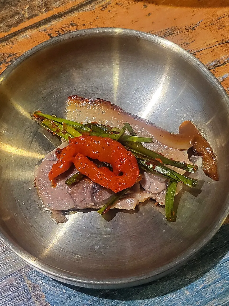 Jokbal served with radish salad on the side