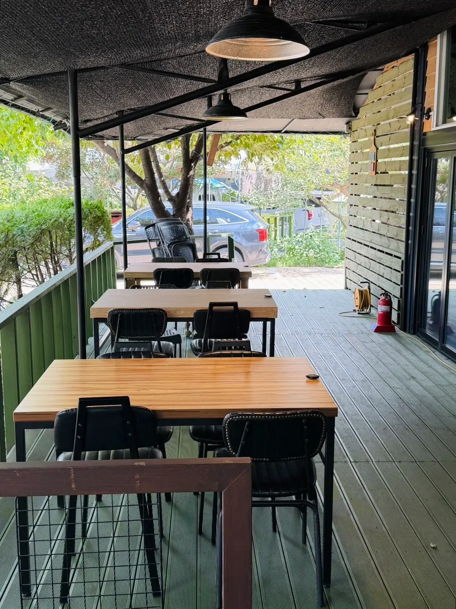 Outdoor terrace tables at Myeongimong