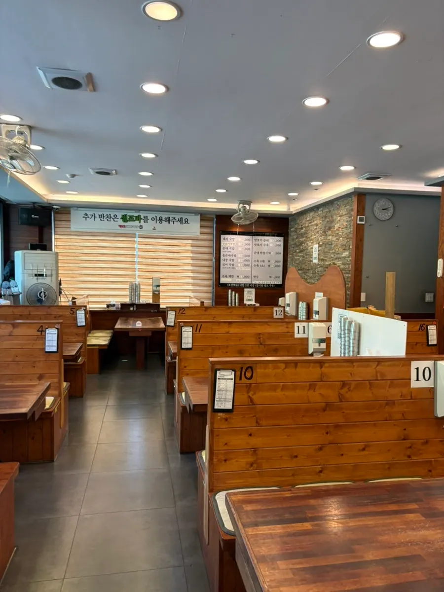 Quiet interior of Myeongin Dwaeji Gukbap at 3pm