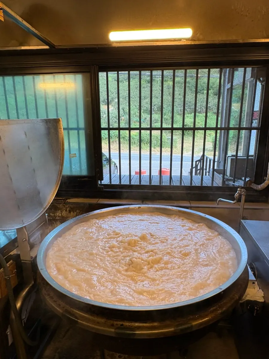 View of the kitchen at Myeongin Dwaeji Gukbap