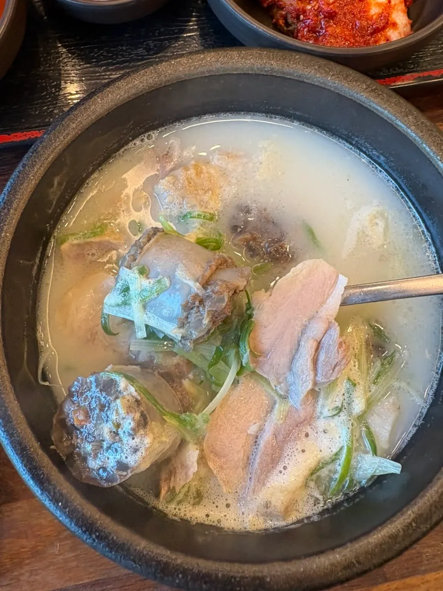 Rice mixed into the pork gukbap broth