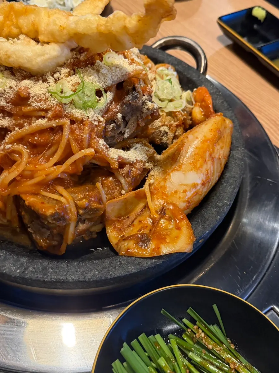 Whole squid in hot stone seafood pork bone jjim