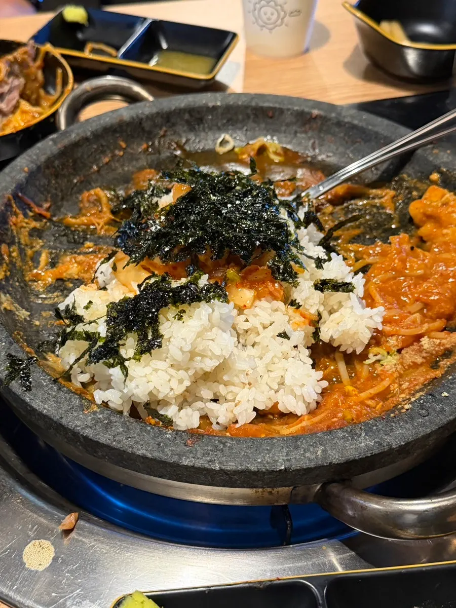Fried rice with kimchi and roasted seaweed flakes