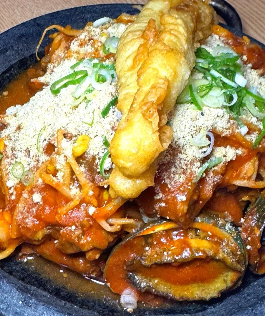 Two-person set with abalone, shrimp, squid, and pork backbones