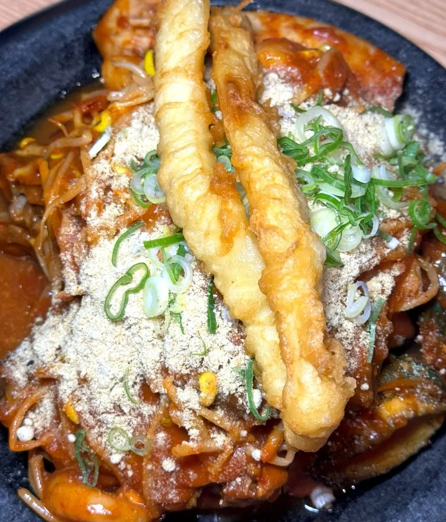 Hot plate with whole squid, shrimp, and pork backbones