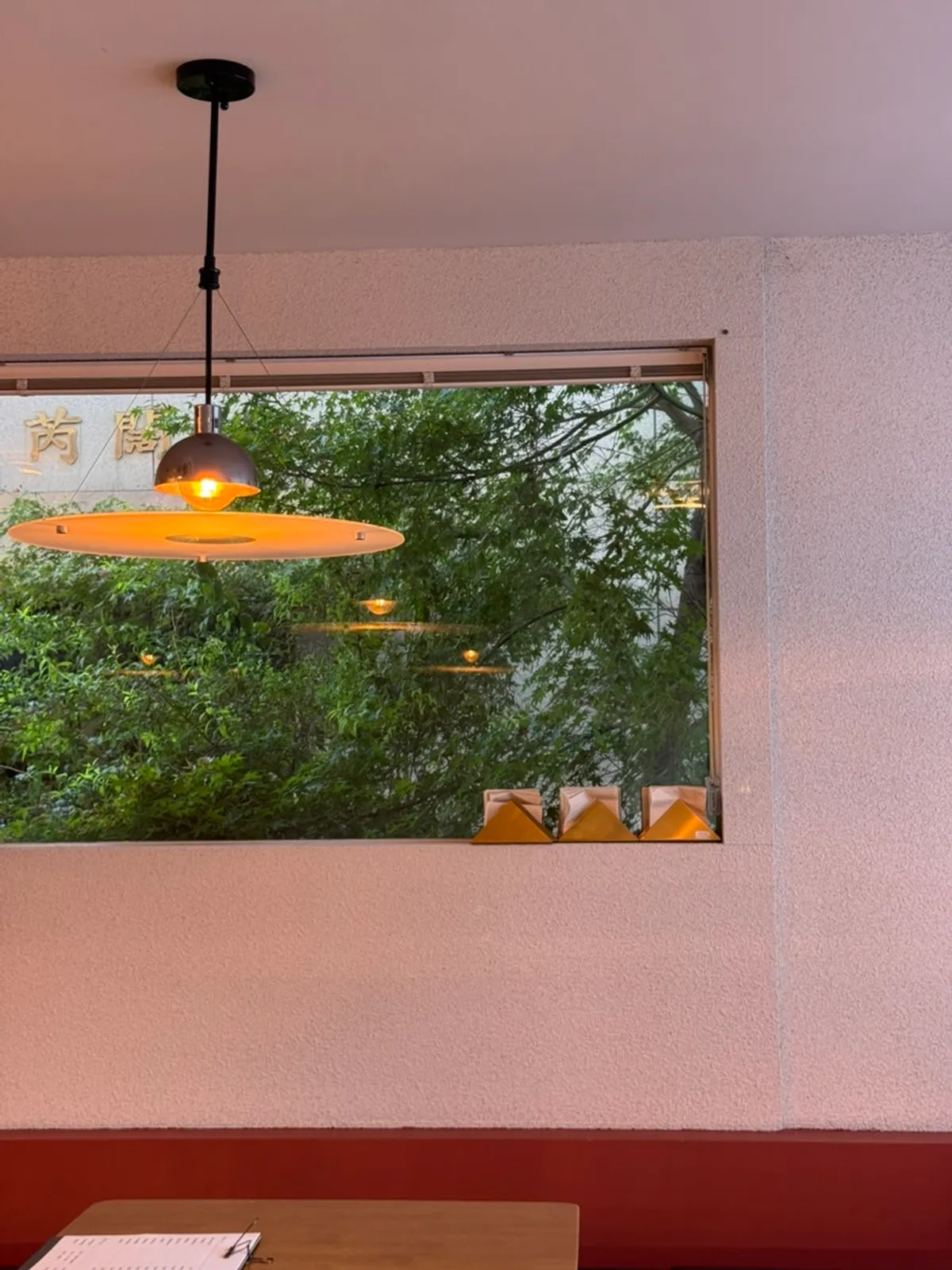 Genji's interior with triangular mirror and lighting