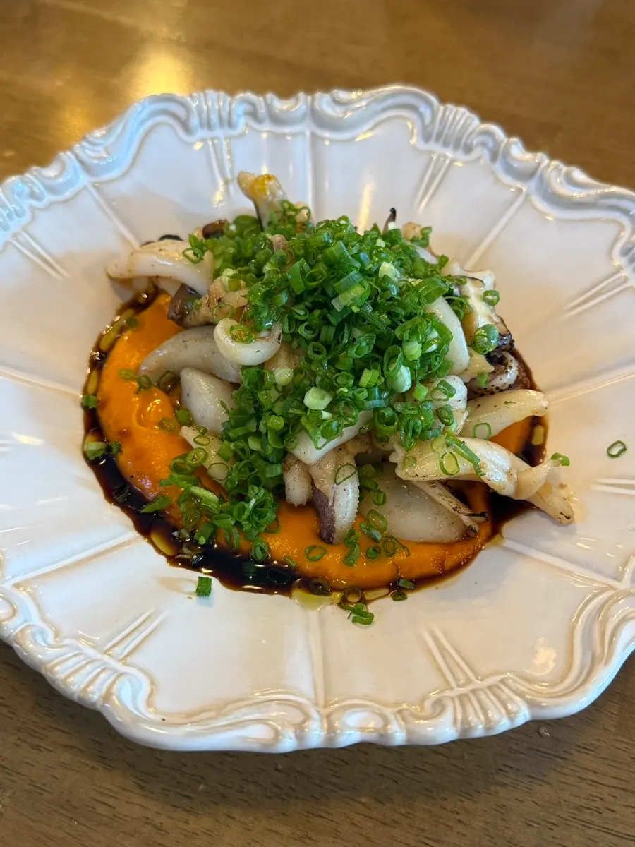 Grilled cuttlefish over carrot purée