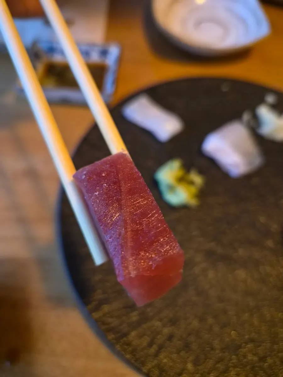 A soft-textured piece of aged sashimi