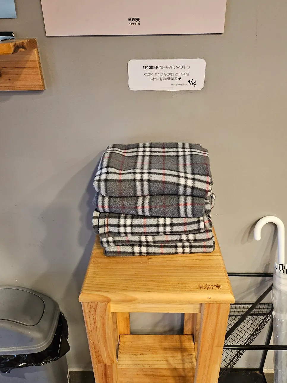 Blanket at the seat and coat hanger in the back
