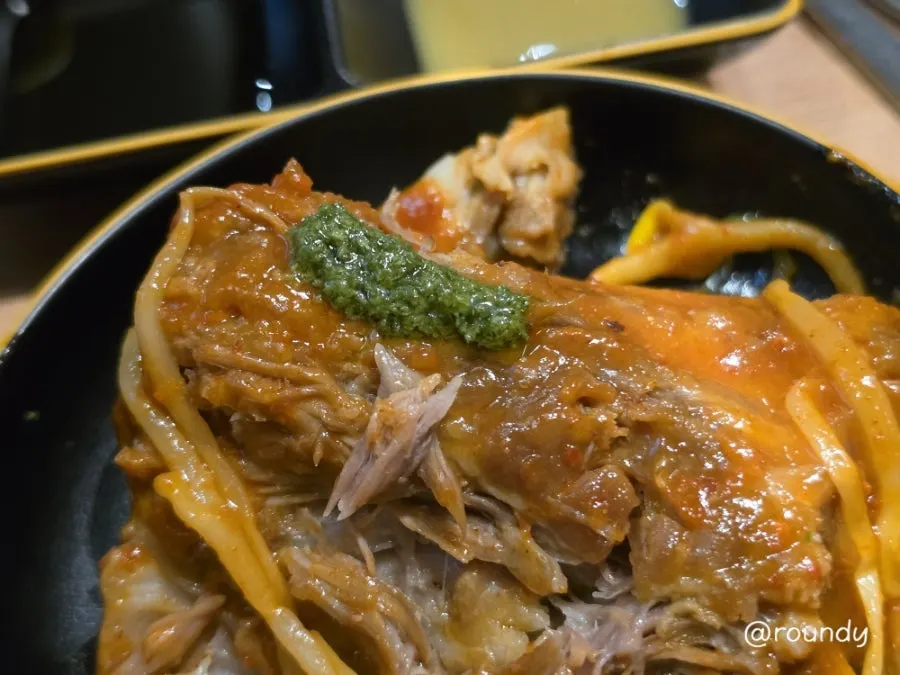 Perilla chimichurri-style sauce spooned over meat