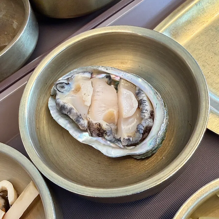 Three kinds of sashimi served with mulhoe