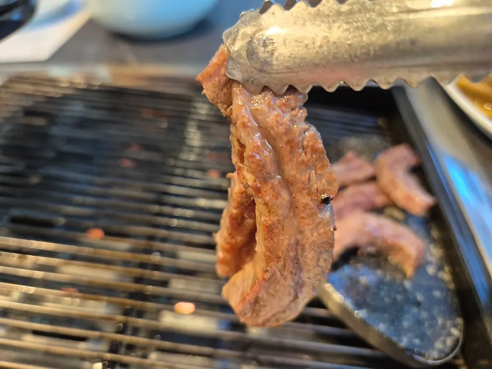 Hanwoo galbisal cooking on the grill