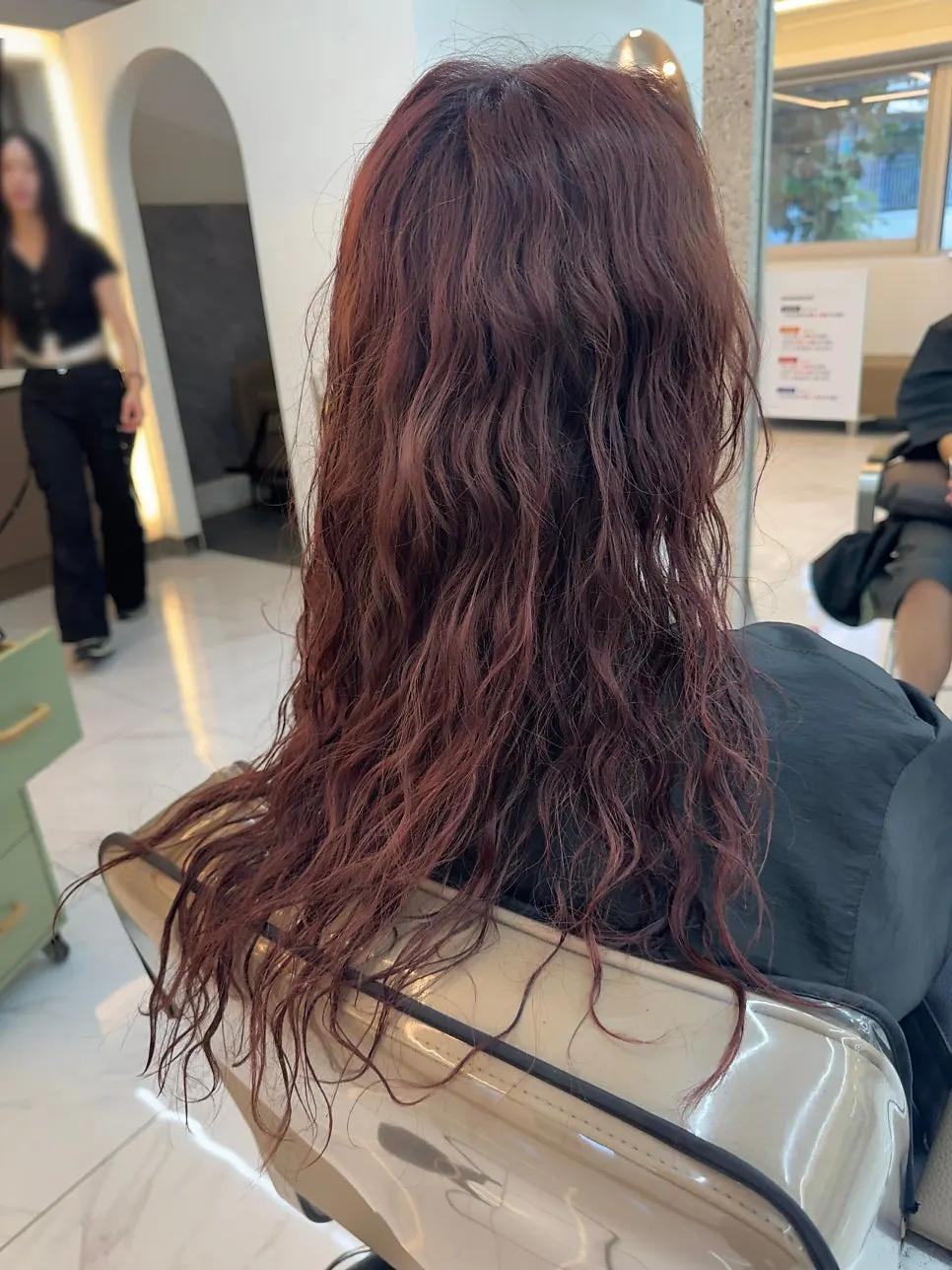 Curl cream finishing touch on permed curls