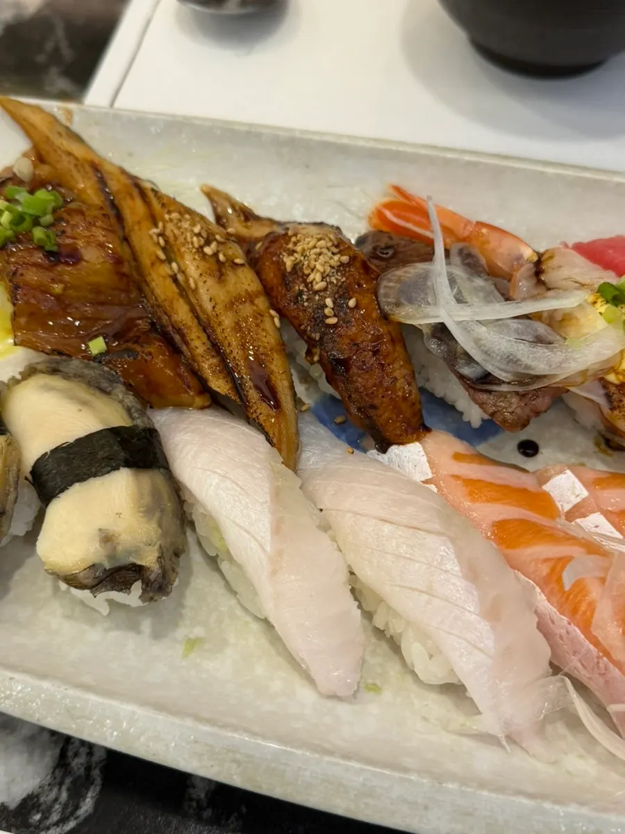 Close-up of white fish sushi and shrimp sushi