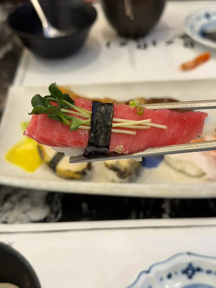 Eel sushi topped with a sweet-salty sauce