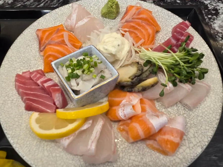 A vibrant, colorful plate of Moshi Moshi Sushi's sashimi platter