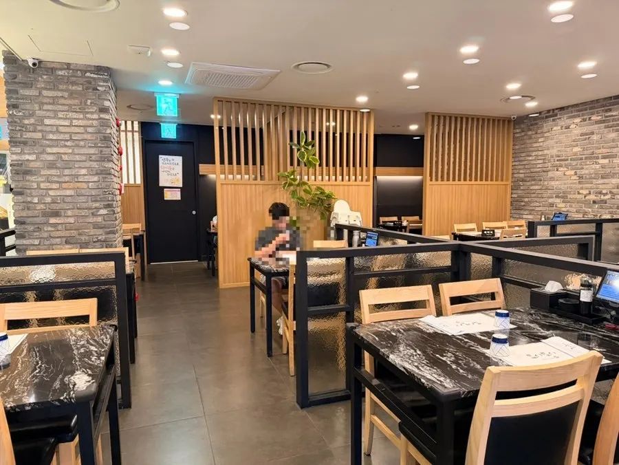 Interior with bar seats and tables