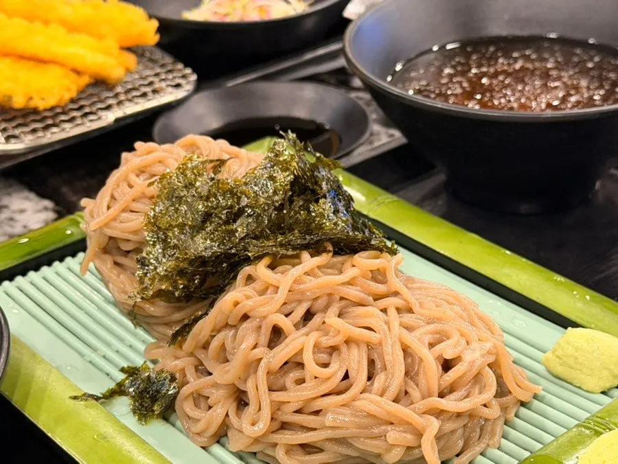Cold soba broth with floating shaved ice