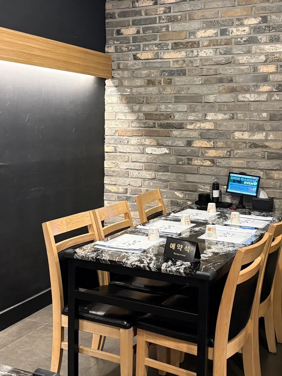 Partitioned room-like seating area in the back