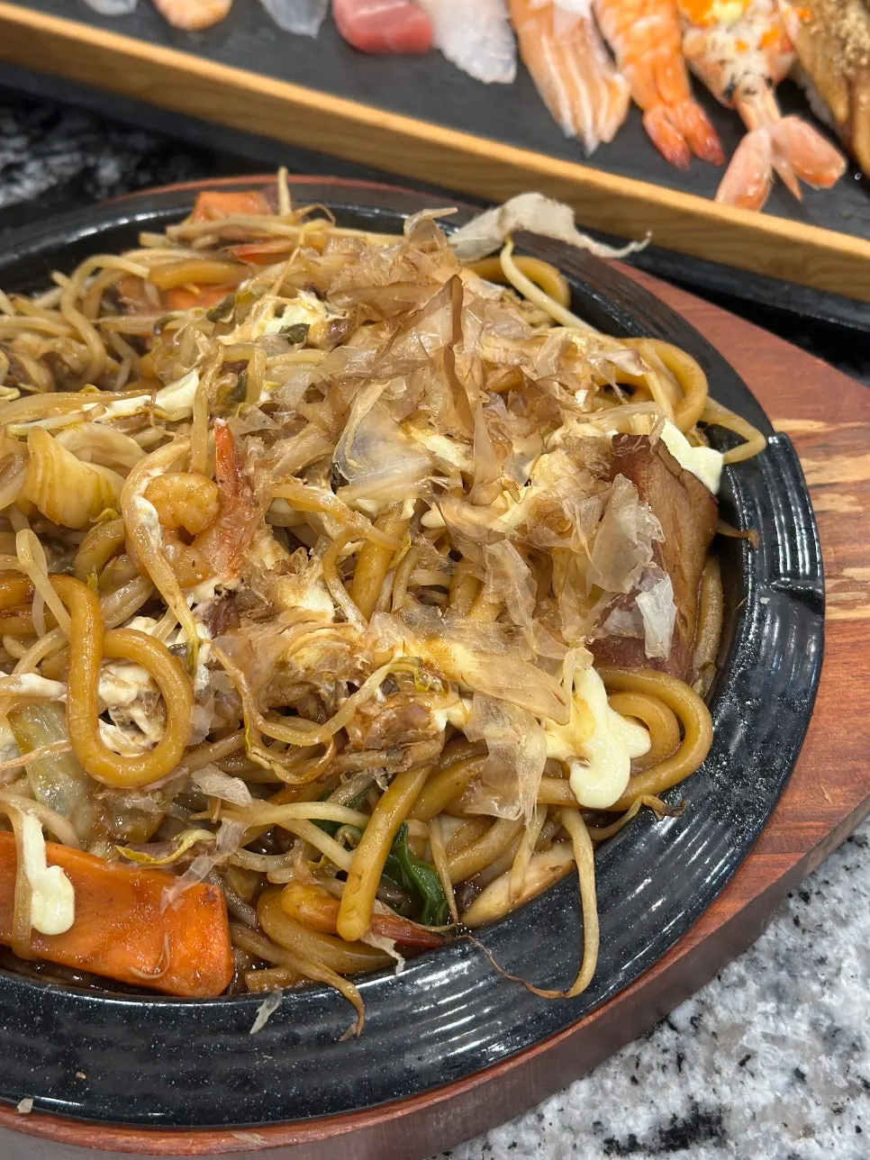 Lifting up the chewy udon noodles