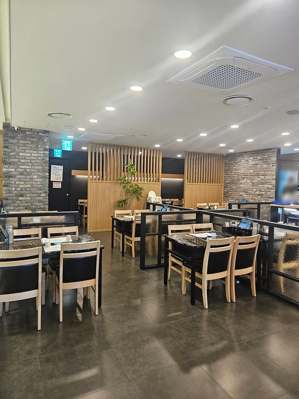 Interior of Moshi Moshi Sushi with widely spaced tables