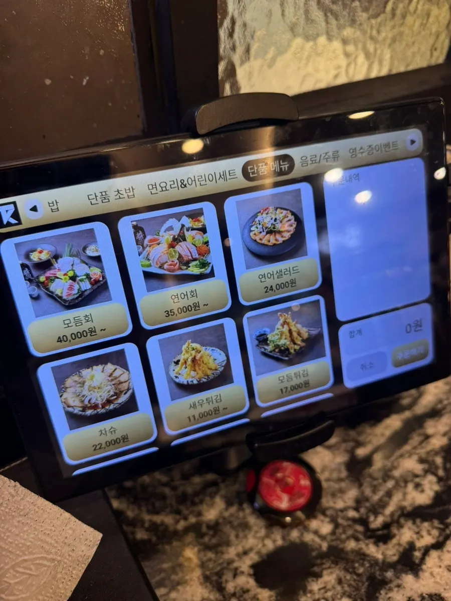 Moshi Moshi Sushi noodle dishes and tempura menu board