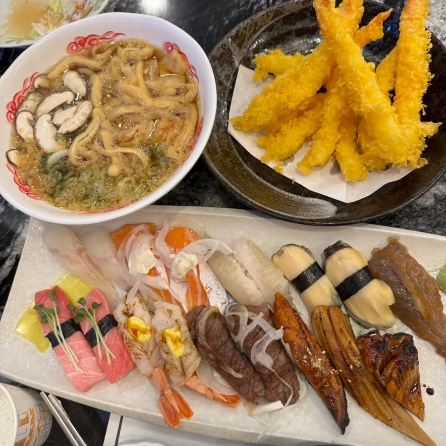 Set 4 spread with udon, shrimp tempura, and 18-piece sushi