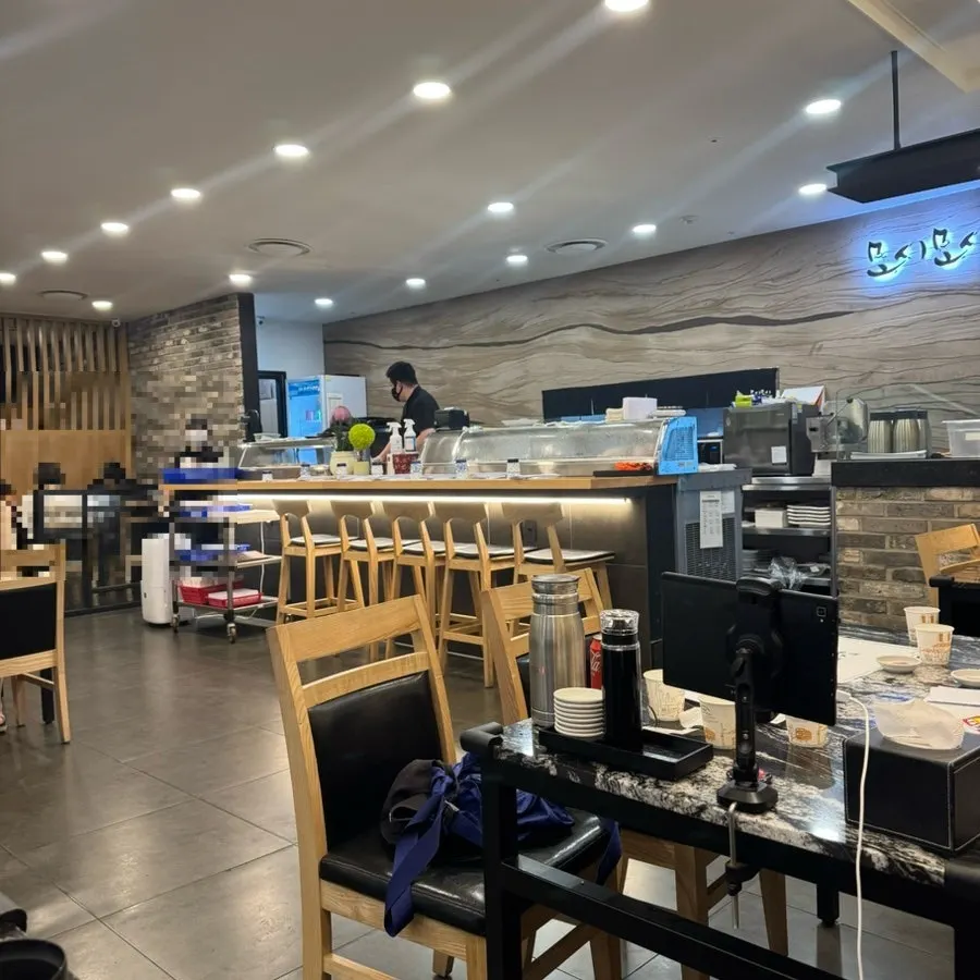 Picking up a piece of sushi