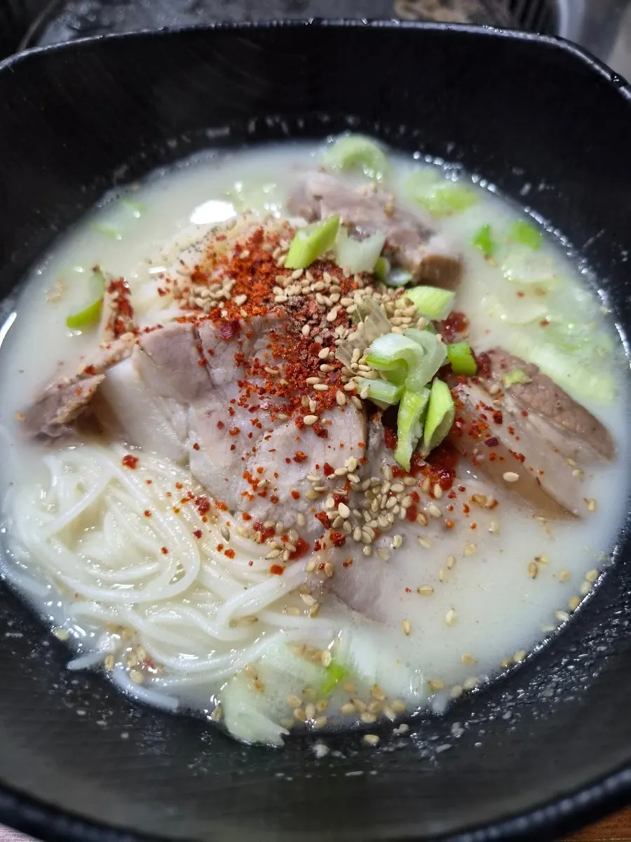 Extra order of Jeju pork noodle soup and naengmyeon