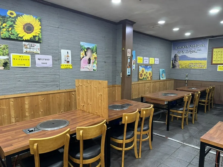 Interior tables with the feel of a neighborhood pork restaurant
