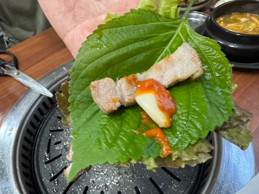 A chewy grilled piece of pork belly