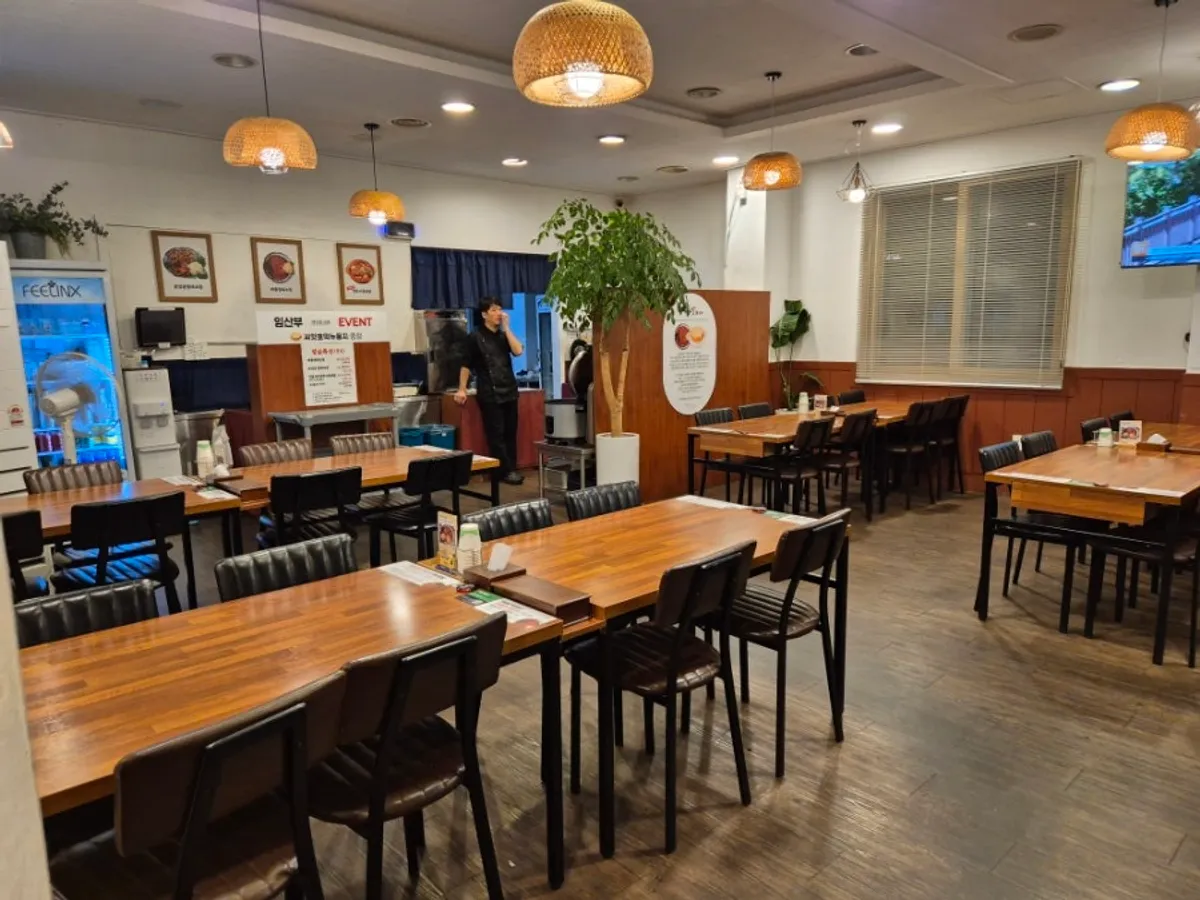 Wood-toned interior of Myeongtaerang Ryu Myeongho Main Branch